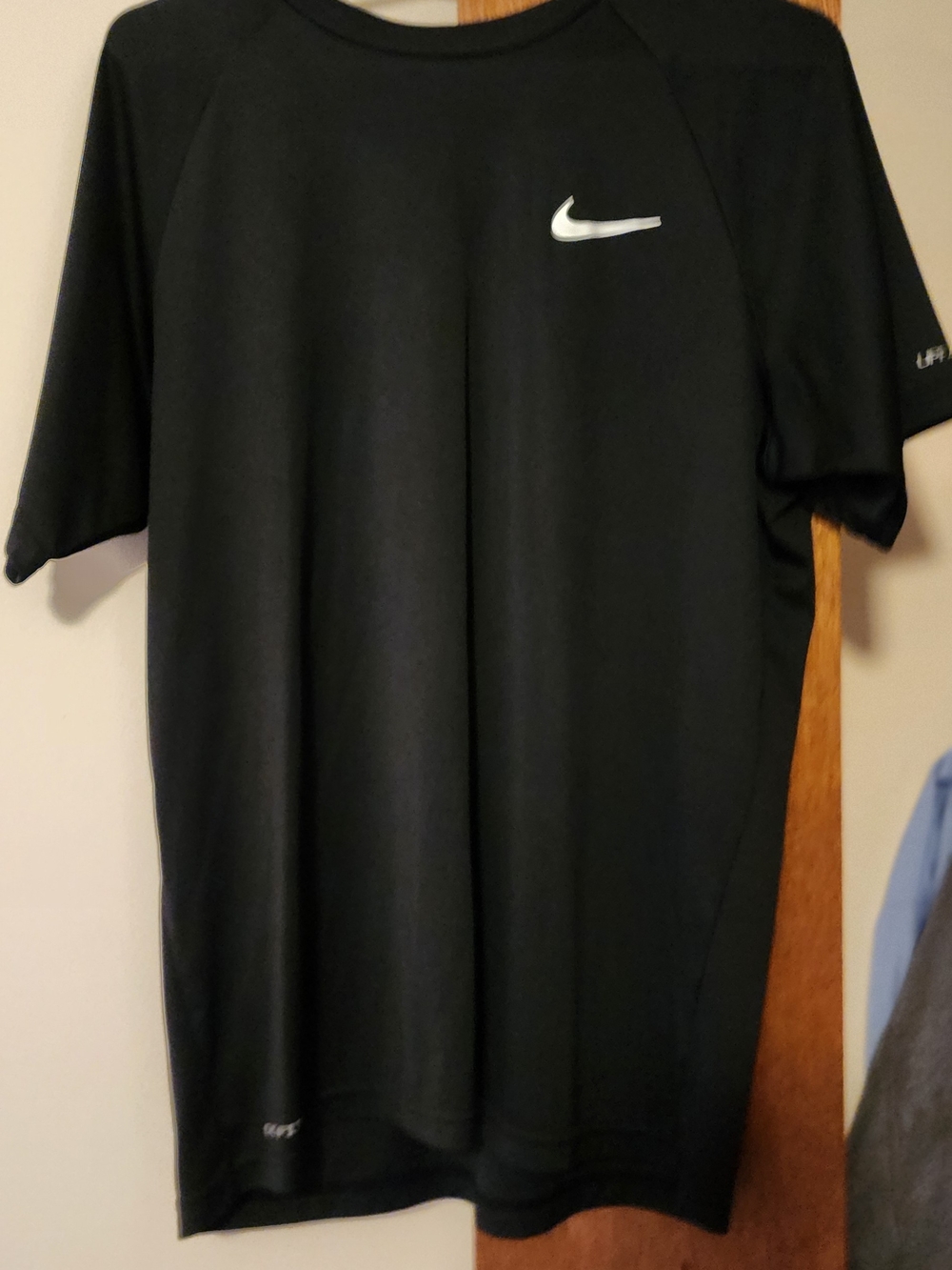 Nike Black Short Sleeve Athletic Tee with White Swoosh